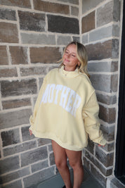 Mother Embroidered Mockneck Sweatshirt- Butter Yellow