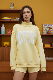Mother Embroidered Mockneck Sweatshirt- Butter Yellow